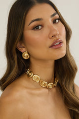 Noxelle Spiral Shell Earrings Gold
